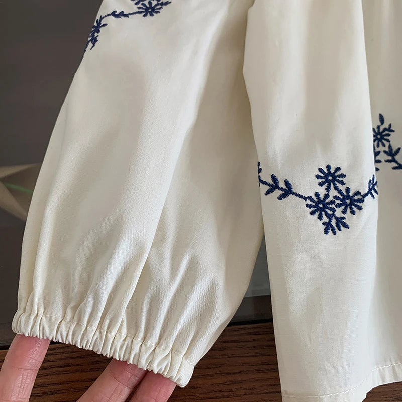 Embroidered Blouse and Heart Jeans