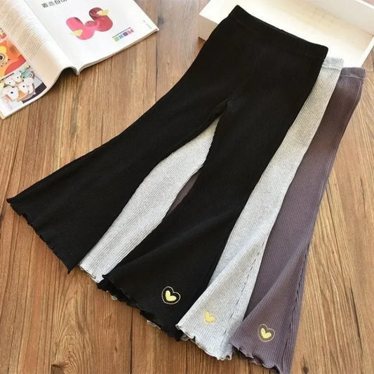 Girls' flared leggings with an elastic waistband