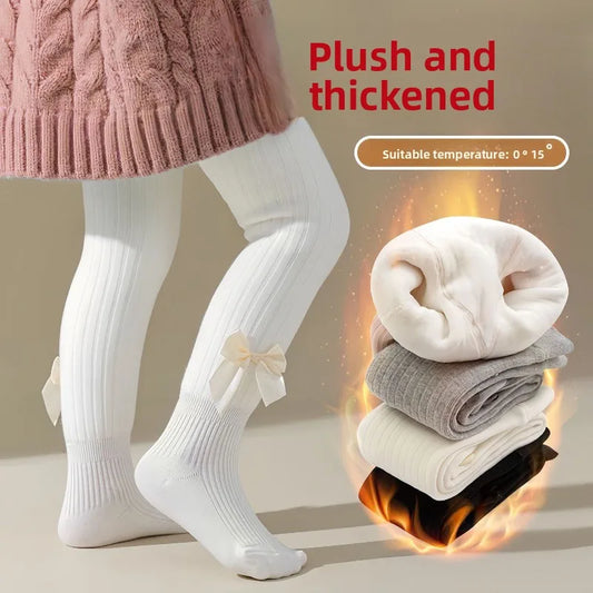 Girls' plush-lined winter tights with bow detail