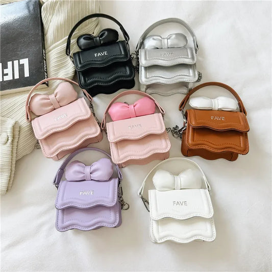Girls' bow shell shoulder bag with adjustable strap