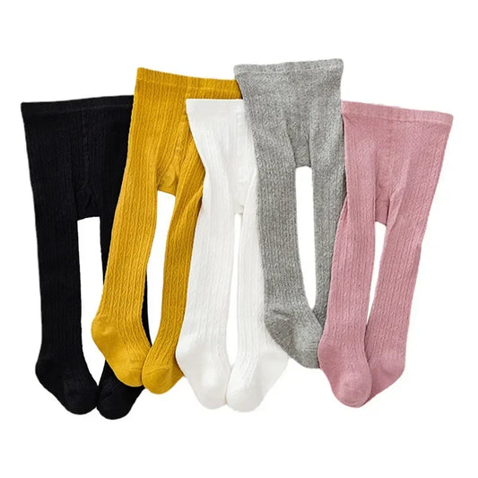 Girls' solid-color knit tights in assorted colors