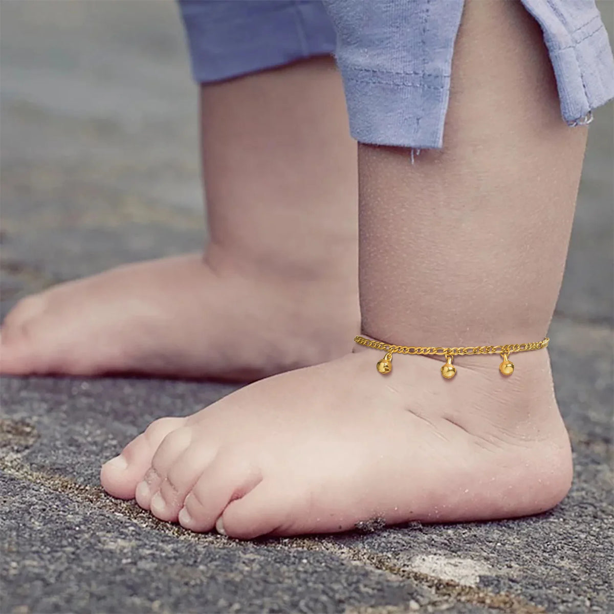 Little girl wearing adjustable charm bell beaded anklet jewelry
