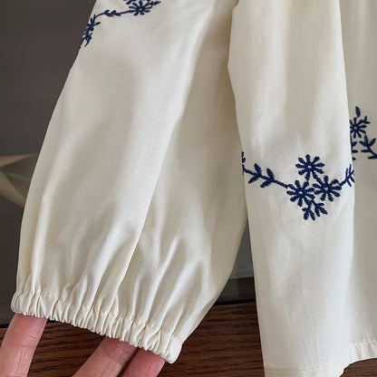 Embroidered Blouse and Heart Jeans